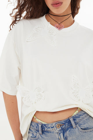 Cotton t-shirt with adjustable butterfly brooches